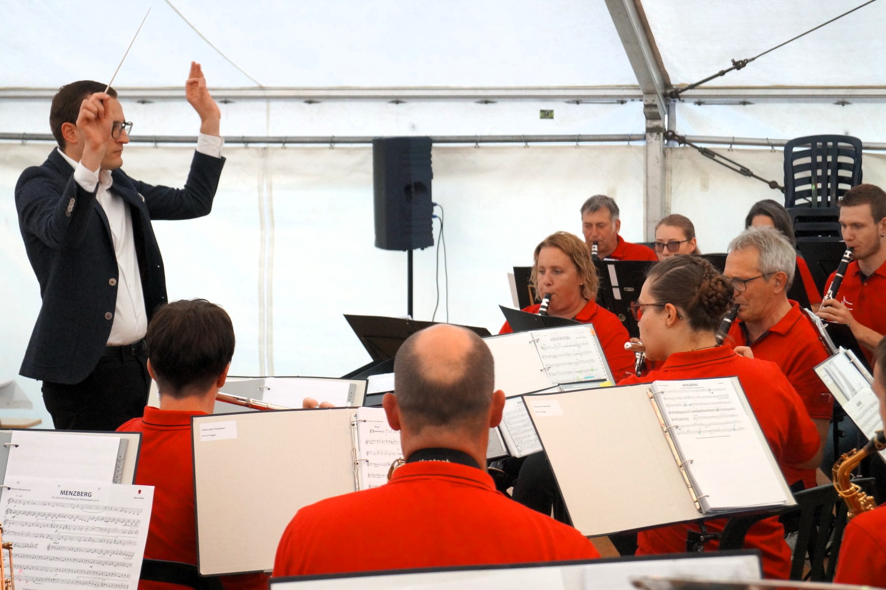 Am 22. Juni 2024 fand in Ruswil auf dem Märtplatz das zweite Blasmusik OpenAir statt. Die Ortsmusik Rüediswil spielt den Marsch Menzberg von Mario Bürki.